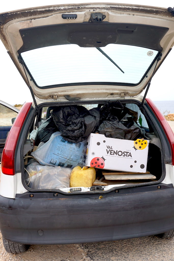 Car boot filled with trash collected at a coastal cleanup