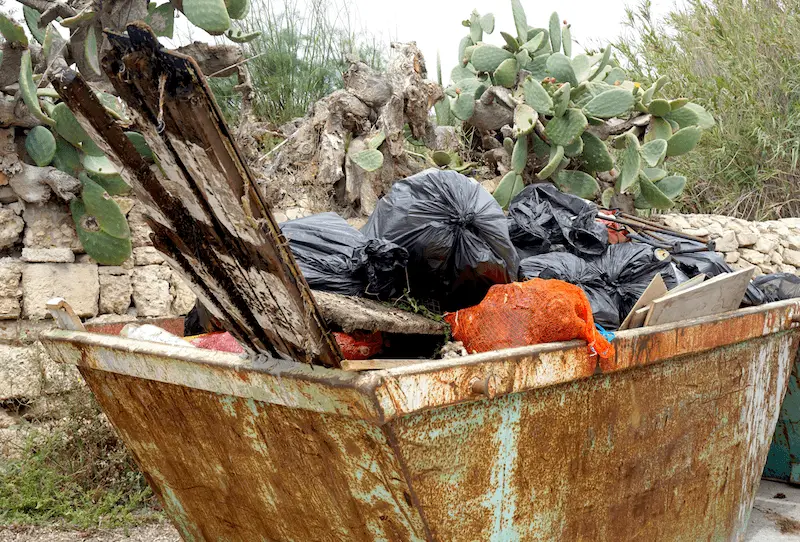 Full dumpster after a coastal cleanup in Malta