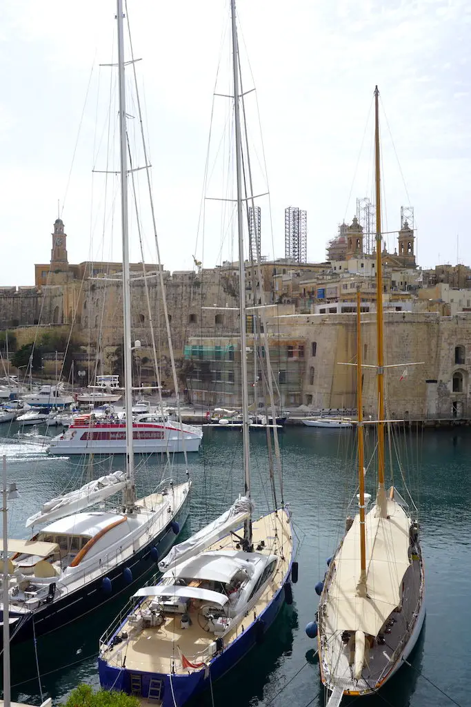 Sailboats in the Grand Harbour of Malta and the ferry to Valletta