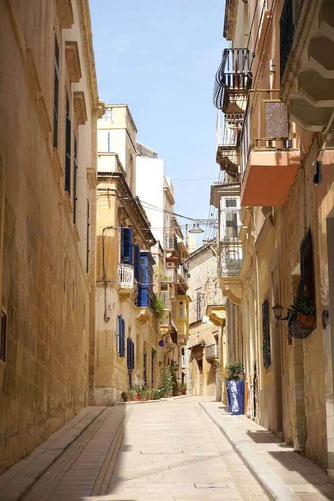 Beautiful balconies overhead on the streets of the Three Cities in Malta