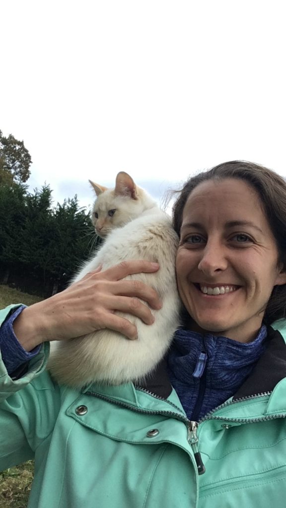 Amanda Walkins and cat on her shoulder petsitting in Spain