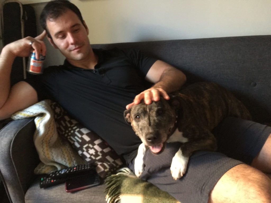 Housesitter Jonathan Clarkin with dog Mama Cass