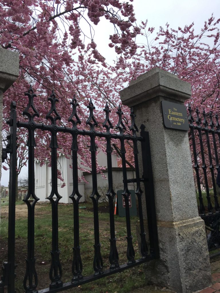 Gate to Eastern Cemetery with a small plaque - Portland Maine walking tour