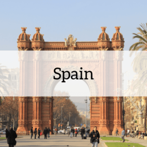"Spain" overlaid on an image from the country